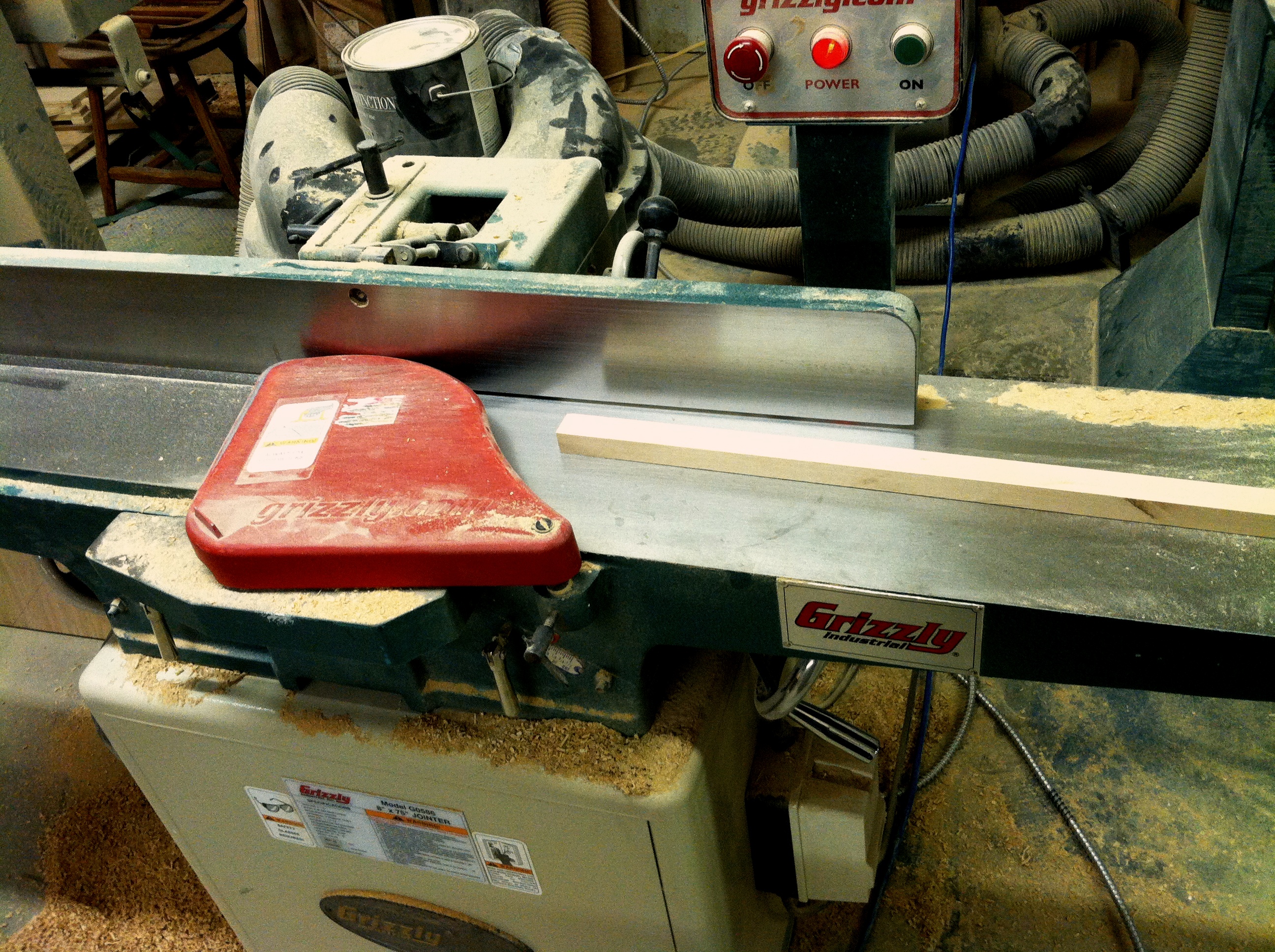 A small piece of Maple being squared on the jointer