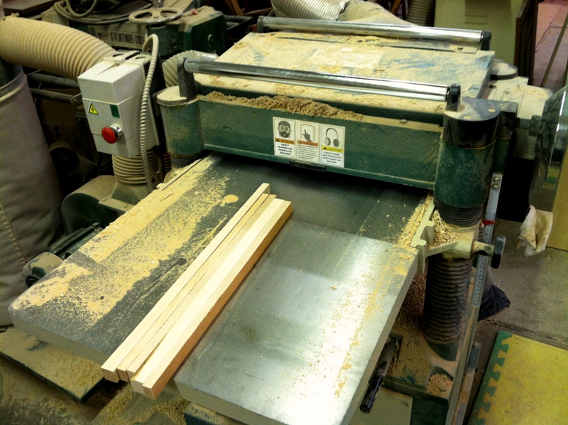 A small piece of Maple being squared on the planner